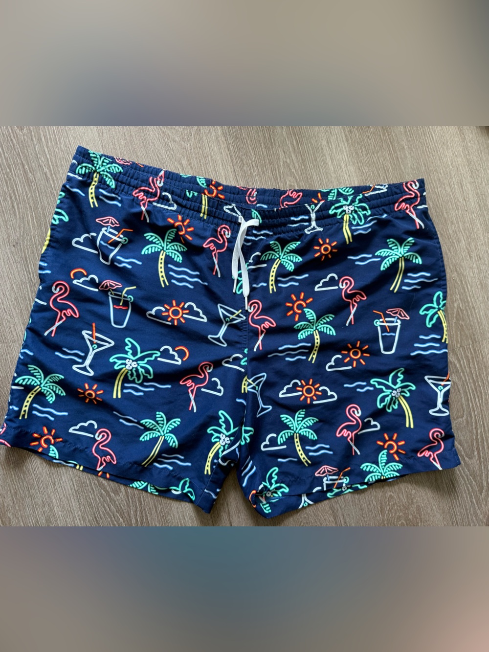 chubbies Red & White Striped Swim Trunks with Blue Logo Tag